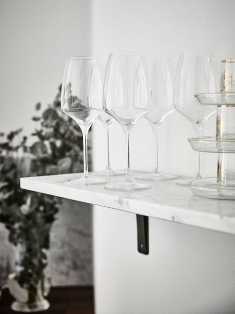 I’m seriously loving all the soft grey tones coming from the Swedish apartments lately … and they all seem to have beautiful herringbone floors | photos by Anders Bergstedt for Entrance ~ xx debra   B Herringbone Floors, Swedish Apartment, Marble Shelf, Herringbone Floor, Grey Tones, Champagne Flute, Wine Glass, Entrance, Apartment