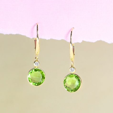 Discover our collection of August birthstone jewelry! 💚✨ Peridot, with its vibrant yellow-green hue, symbolizes opportunity and prosperity. These round Peridot Earrings by artist Olivia B feature checkered peridot dangling from bezel-set diamonds! Find the perfect gift for yourself or a loved one today! 🎁✨🫶💎💚 #GreenLakeGallery #GreenLakeJewerlyWorks #jewelrygallery #seattle #seattlegallery #artjewelry #jewelryart #contemporaryart #contemporaryjewelry #wearableart #uniquegifts #uniquejewelr... Peridot Earrings, August Birthstone Jewelry, Green Lake, August Birthstone, Bezel Set Diamond, August Birth Stone, Contemporary Jewelry, Birthstone Jewelry, Bezel Setting