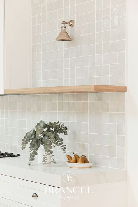 Warm grey square tiled backsplash in kitchen with timber shelf and marble look counter. Interior Design by Branche Designs. Tiled Backsplash Kitchen, Kitchen Cabinets Colour, Square Tile Backsplash, Kitchen Wall Tiles Design, Open Kitchen Cabinets, Colour Home, White Kitchen Splashback, Kitchen Splashback Tiles, Simple Bathroom Designs