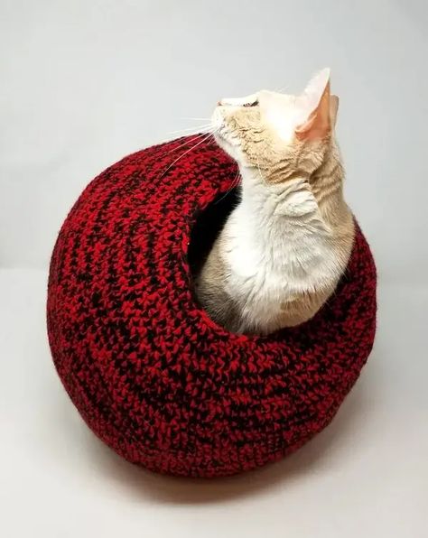 Grab your crochet hook and make one of these super snuggly homes for your kitty or small dog! They'll love lounging and sleeping in these cozy pods. Get the Pattern here Cat Cave Crochet Pattern, Crochet Cat Cave, Crochet Wristlet, Cat Bed Pattern, Egg Crochet, Cat Pod, Gato Crochet, Garland Crochet, Kat Haken