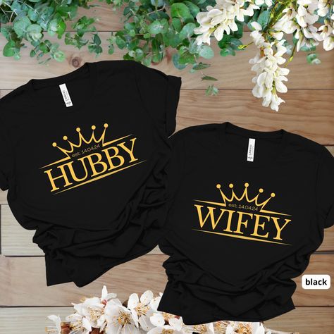 Celebrate your love with our charming couples shirts! These "Wifey " and "Hubby" tees are perfect for newlyweds, honeymoon trips, or just relaxing together. Made from premium soft cotton, these matching shirts ensure comfort and style. 𝗛𝗢𝗪 𝗧𝗢 𝗢𝗥𝗗𝗘𝗥? 𝟏. Select the shirt 𝗦𝘁𝘆𝗹𝗲 2. Select the 𝗦𝗶𝘇𝗲 3. Select the shirt color 4. Select the quantity, 5. Click 𝗔𝗗𝗗 𝗧𝗢 𝗖𝗔𝗥𝗧. If you want to buy more than one, please go back to the listing and repeat the steps. "If you have any q Married Couple Shirts, Funny Couple Shirts, Wifey Sweatshirt, Couples Shirts, Married Shirt, Wife And Husband, Wedding Shirt, Marriage Anniversary, Husband Shirts