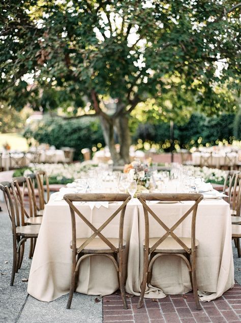 Wood cross-back chairs Wood Cross Back Chairs Wedding, Wood Chair Wedding, Wood Chairs Wedding, Rustic Reception Ideas, Crossback Chairs Wedding, Malibu Beach Wedding, California Ranch Wedding, Ocean View Hotel, Intimate Garden Wedding