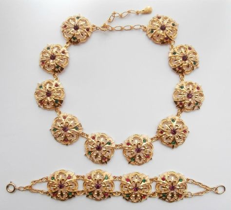 This jewellery set is part of a recently released UK 'Deadstock' consignment, all new & previously unworn! It is comprised of a collarette necklace & bracelet, made in a Baroque style out of bright gold-tone metal, with multi-coloured glass stones. The items pictured are the items you will receive. Please see my other listings for a set in a slightly darker gold. Perfect to finish a Vintage or Retro outfit! These items are among the 100+ items bought by the costume Buyer for 'Bridgerton' recently, so I have made a similar selection for my ebay shop! Please read the listing in full & supersize all photos as I don't take returns, so items are bought as seen & described. The necklace is 14 1/2" to 17 1/2" in length & 1 1/8" deep, & the bracelet is 7 3/4" long. BNWOT Vintage 1980's Bright Gold Retro Outfit, Antique Jewelry Necklace, Baroque Style, Baroque Fashion, Bright Gold, Dark Gold, Jewellery Set, Antique Jewellery, Vintage Jewellery