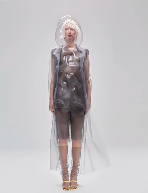 ying gao creates robotic clothing that reacts to the chromatic spectrum Robotic Clothing, Ying Gao, Robot Clothes, Floating Water, Body Movement, Navy Sailor, Flowing Water, Ballet Tutu, Floating In Water