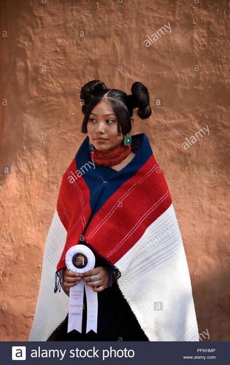 Download this stock image: A young Native-American (Hopi) woman wearing traditional Hopi clothing, jewelry and hairstyle at the Santa Fe Indian Market. - PFKHMP from Alamy's library of millions of high resolution stock photos, illustrations and vectors. Hairstyles Mexican, Native American Hair, Hopi Tribe, Mexican Hairstyles, American Indian Girl, Native American Headdress, Native American Clothing, Native American Photos, Indian Market