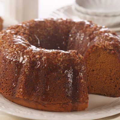 Pumpkin makes a delightful addition to your rum cake! The rum butter glaze in this recipe adds elegance and flavor to this classic cake. Pecan Rum Cake, Boozy Cakes, Jamaican Patties, Rum Cakes, Pumpkin Food, Buttermilk Pound Cake, Rum Cake Recipe, Pumpkin Recipe, Ginger Cake