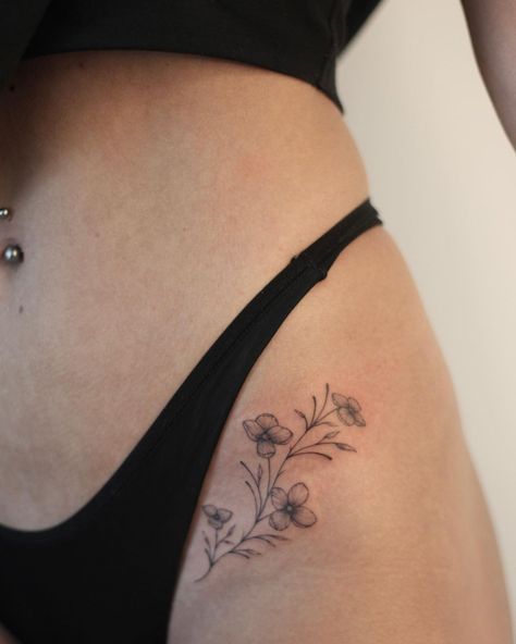 Dainty Flower Tattoos Hip, Violet Hip Tattoo, Flower Tattoo On Hip Bone, Marigold Hip Tattoo, Minimal Hip Tattoos Women, Small Inner Thigh Tattoos, Inside Hip Tattoo, Thigh Small Tattoos Women, Flower Tattoos Aesthetic