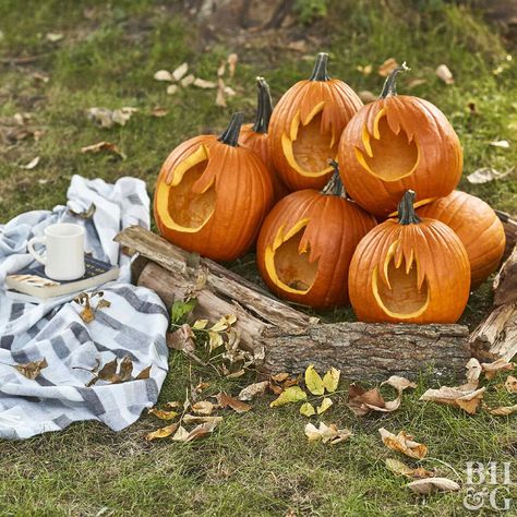 This project combines two fall favorites—campfires and pumpkins! Pumpkin Carving Stencils Free, Pumpkin Stencils, Halloween Diy Outdoor, Creative Pumpkin Carving, Easy Pumpkin Carving, Pumpkin Display, Pumpkin Carving Patterns, Halloween Decorations Diy Outdoor, Farmhouse Halloween