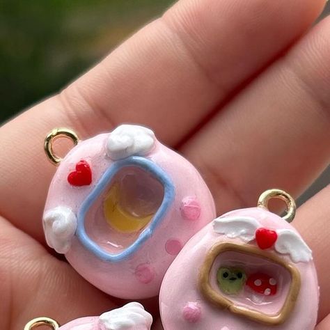 angel | kawaii clay art (´,,•ω•,,)♡ on Instagram: "yay pink tamagotchis !!  . #polymerclay #clayartist #kawaiicharms #cutecharms #cuteclay #claycharms #kawaii #cute #art #artist #sanrio #sanriocharms #cinnamoroll #usahana #badtzmaru #kuromi #mymelody #pompompurin" Clay Tamagotchi, Cinnamoroll Clay, Kawaii Clay, Badtz Maru, Cute Clay, Cute Charms, Clay Charms, Dry Clay, Air Dry Clay