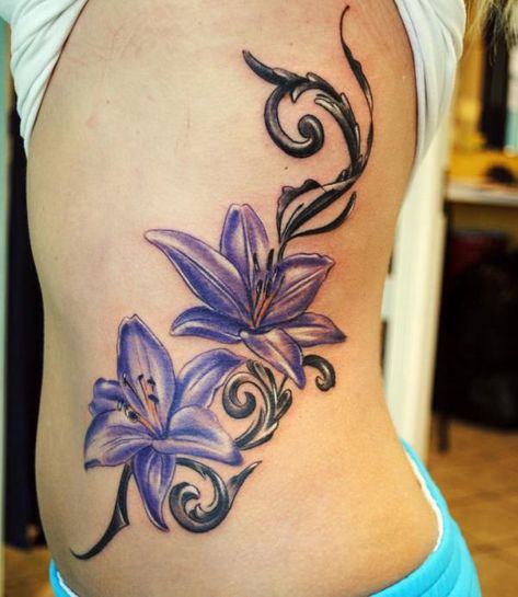 Lily Flower Tattoos | Lily Song Tattoo Design by Denise A. Wells Purple Lily Tattoo, Delicate Feminine Tattoos, Violet Flower Tattoos, Tattoo On Foot, Lily Tattoo Design, Flower Tattoo On Side, Sunflower Tattoo Sleeve, Sunflower Tattoo Shoulder, Lily Flower Tattoos