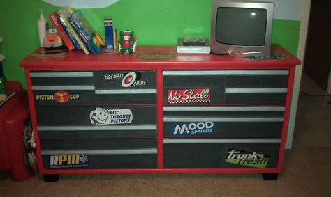 Refurbished an old dresser for my son to look like a tool box. Nothing, but paint and a few strips of wood from Home Depot to make the handles. Tool Box Dresser Diy, Video Game Dresser Diy, Dresser Toolbox Diy, Tool Box Dresser Boy Rooms, Snap On Tool Box Dresser, Tool Box Dresser, Monster Truck Organization Boy Rooms, Captain Caveman, Truck Room