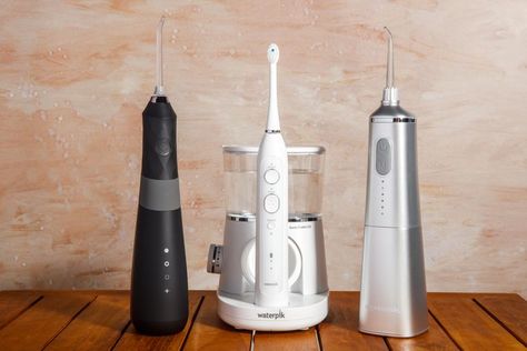 We Tested the 6 Best Wet Flossers of 2022 for Squeaky-Clean Teeth Tongue Cleaner, Healthy Juice Recipes, Water Flosser, Best Water, Sensitive Teeth, Healthy Juices, Electric Toothbrush, Design Minimal, Teeth Cleaning