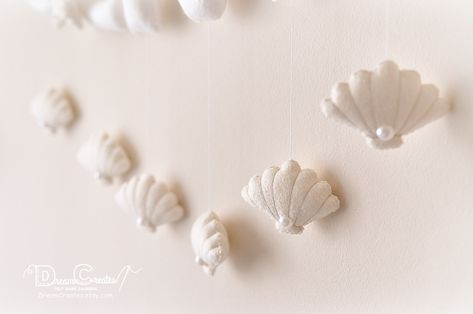 Pastel Ocean Nursery, Shell Nursery Theme, Under The Sea Neutral Nursery, Underwater Nursery Theme Girl, Seashell Nursery Decor, Ocean Girl Nursery, Pearl Nursery, Under The Sea Nursery Girly, Neutral Ocean Nursery