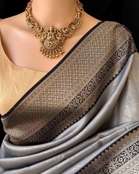 ₹ 1690/- Ash grey art silk saree with black zari border. Comes with contrast black pallu and blouse. Wash care: Normal wash. Find this saree in our website: Www.thejacouture.in> silk sarees> Ash grey art silk saree. Jewellery from: @anvi__jewellery #saree #artsilksarees #greysaree #sareelove #traditionalsaree #sareestyle #sareedraping #jewellery Silk Saree Jewellery, Grey Saree, Saree Jewellery, Art Silk Sarees, Grey Art, Traditional Sarees, Saree Styles, Ash Grey, Silk Saree