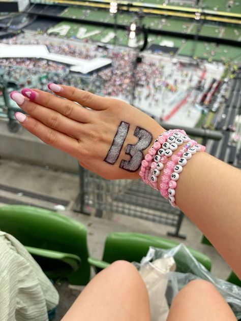 celebrate the singer's music and evolution over time. Choose from bracelets inspired by her debut album, Fearless, Red, 1989, Reputation, Lover, and 13 Eras Tour Hand, 13 Hand Tattoo, Taylor Swift Bracelets, Music Bracelet, Swift Bracelets, Swift Concert, Lovers Bracelet, Taylor Swift Eras Tour