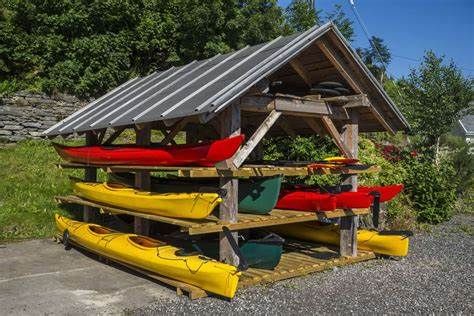 8 Different Kayak Storage Ideas (Get that thing off the ground!) Kayak Storage Ideas, Diy Kayak Storage Rack, Diy Kayak Storage, Kayak Storage Garage, Canoe Storage, Canoe Rack, Kayak Stand, Kayak Storage Rack, Roof Storage