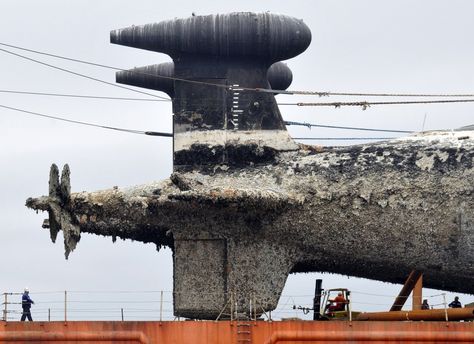 In its apparent state of decay, it's no wonder the sub had to be hauled to its seaside destination. Russian Submarine, Navi A Vela, State Of Decay, Nuclear Submarine, Military Pictures, Navy Ships, Amazing Photos, Military History, Abandoned Places