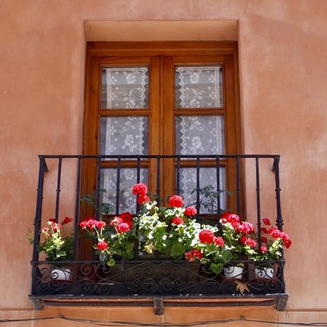 Spanish Balcony Ideas, Mexican Balcony, Rustic Spanish Home, Spanish Balcony, Balcony With Flowers, Rustic Balcony, Wrought Iron Window Boxes, Summer Balcony, Mediterranean Apartment