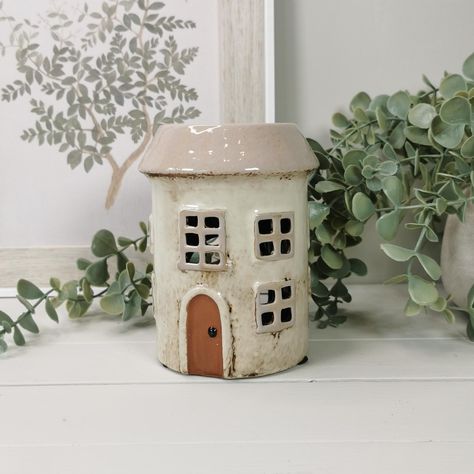 Not Quite Perfect, Village Pottery ceramic house wax melt / oil burner. This burner has a small chip on the back. Please see photo for details. Create a magical warm glow whilst warming your wax melts with this gorgeous rustic house wax warmer. With neutral tones this also makes a fantastic ornament when not in use. Unfortunately I cannot accept returns on this item. Measurements H 13.5cm x W 10cm x D 10cm. Air Dry Clay Oil Burner, Ceramic Wax Warmer Handmade, Air Dry Clay Wax Melter, Wax Burner Ceramic, Ceramic Wax Warmer, Ceramic Wax Melter, Wax Melt Burner, Pottery Houses, Pot Hanger