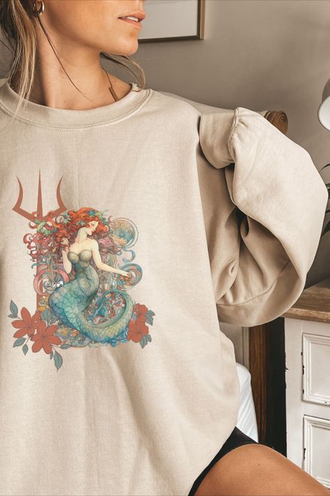 This unique and stylish mermaid design can be a great step into the mermaidcore trend, looks creat with cycling shorts or tucked into jeans Mermaid Sweatshirt, Mermaid Illustration, Mermaid Core, Mermaid Design, Fashion Unique, Favorite Sweater, Cycling Shorts, A Sea, Under The Sea