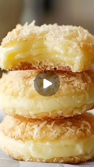 Alla Driksne | Online Cake Academy on Instagram: "Coconut Lemon Curd Cookies 🍋🥥

Ingredients:
1 1/2 cups all-purpose flour
1/2 teaspoon baking powder
1/4 teaspoon salt
1/2 cup unsalted butter, softened
3/4 cup granulated sugar
1 large egg
1 teaspoon vanilla extract
1/2 cup lemon curd
1/2 cup shredded coconut, toasted
Extra shredded coconut for topping
Directions:

In a medium bowl, whisk together flour, baking powder, and salt.
In a large bowl, cream together butter and sugar until light and fluffy. Beat in egg and vanilla.
Gradually add the flour mixture to the butter mixture, mixing until just combined.
Form the dough into 1-inch balls and make a thumbprint in the center of each. Fill each indent with lemon curd and sprinkle with toasted coconut.
Bake at 350°F (175°C) for 12-15 minutes Heavenly Coconut Lemon Curd Cookies, Coconut Lemon Curd Cookies, Maple Dessert Recipes, Coconut Bake, Lemon Curd Cookies, Curd Cookies, Maple Desserts, Special Cookies, Large Cookies