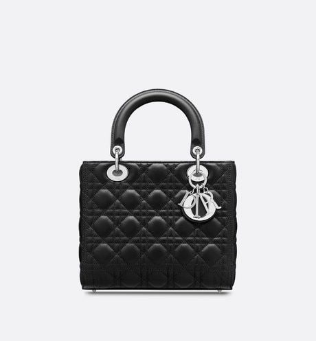 Medium Lady Dior Bag Black Cannage Lambskin - products | DIOR Lady Dior Handbag, Womens Designer Bags, Bag Women Fashion, Christian Dior Couture, Metal Charms, Dior Handbags, Iconic Bags, Metal Charm, The Lady