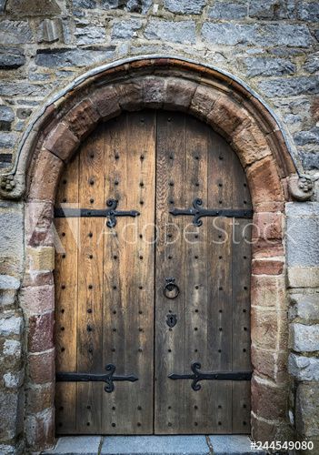 Stock Image: medieval castle wooden door Medieval Doors, White Wooden Doors, Medieval Banquet, Medieval Door, Rustic Tables, Environment Projects, Castle Doors, Castle Gate, Chateau Medieval