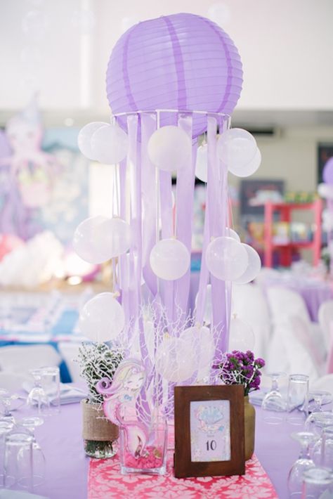 Paper Lantern Jelly Fish Table Centerpiece from an Under the Sea Birthday Party on Kara's Party Ideas | KarasPartyIdeas.com (23) Mermaid Party Favors Bags, Sea Birthday Party Ideas, Mermaid Party Printables, Mermaid Party Food, Sea Party Ideas, Under The Sea Birthday Party, Mermaid Theme Birthday Party, Mermaid Party Favors, Purple Paper