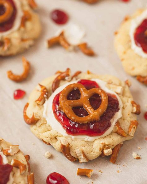 Try my Strawberry Pretzel Pie Cookies, a mouthwatering copycat of Crumbl's cookie version of the popular dessert. Features a soft and chewy sugar cookie base, tempting whipped topping, and of course, strawberry jam! Crumbl Strawberry, Cookie Base Recipe, Chewy Sugar Cookie, Pretzel Pie, Crumble Cookie Recipe, Crumble Cookie, Salty Cookies, Popular Dessert, Homemade Strawberry Sauce