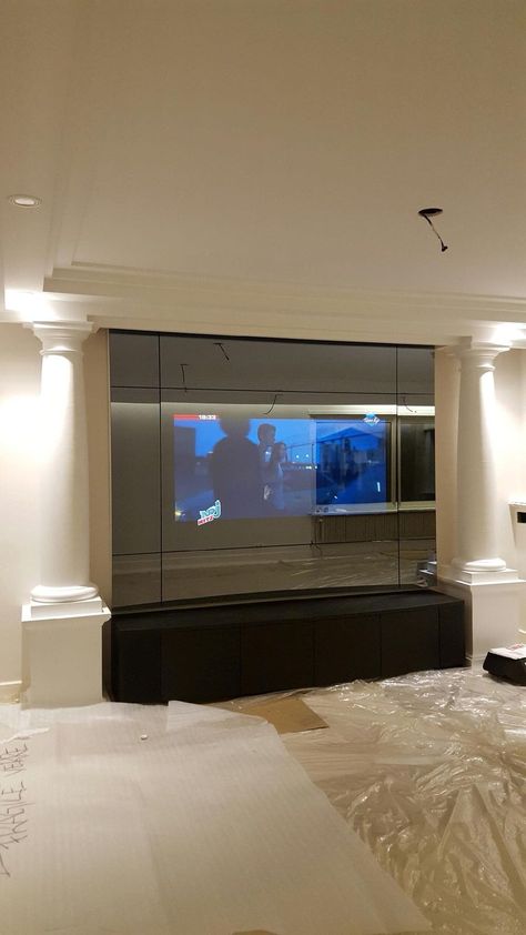 Tv Unit Design Modern, Mirror Tv, Hidden Tv, Unit Design, Luxury Mirror, Luxury House Interior Design, Tv Units, Tv Unit Design, Black Wall