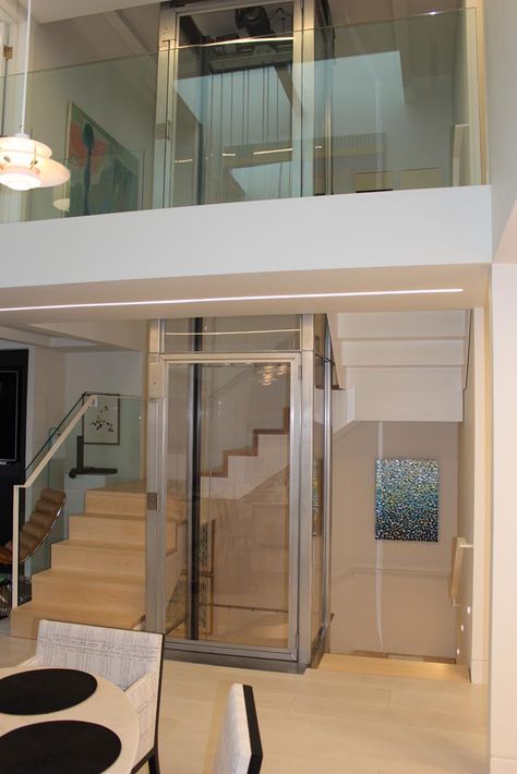 Custom Home Elevators Handcrafted to Suit You | Design a Luxury In-Home Elevator Handcrafted for Your House Glass Elevator Design Interiors, Home Elevators, House Lift, Elevator Design, Glass Elevator, Building House Plans Designs, Stair Storage, Panoramic View, House Elevation