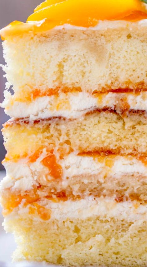 Peaches and Cream Layer Cake ~ Made of soft Yellow Cake layers moistened with some spiked peach syrup, then layered with peach jam and lightly sweetened whipped cream... So simple, but oh so, gooood! Coconut Peach Cake, Peaches And Cream Layer Cake, Peaches N Cream Cake, Italian Peach And Lemon Cake, Peach Filling For Cake, Peach Layer Cake Recipe, Easy Peach Cake, Peaches And Cream Cake Recipe, Peaches And Cream Cake