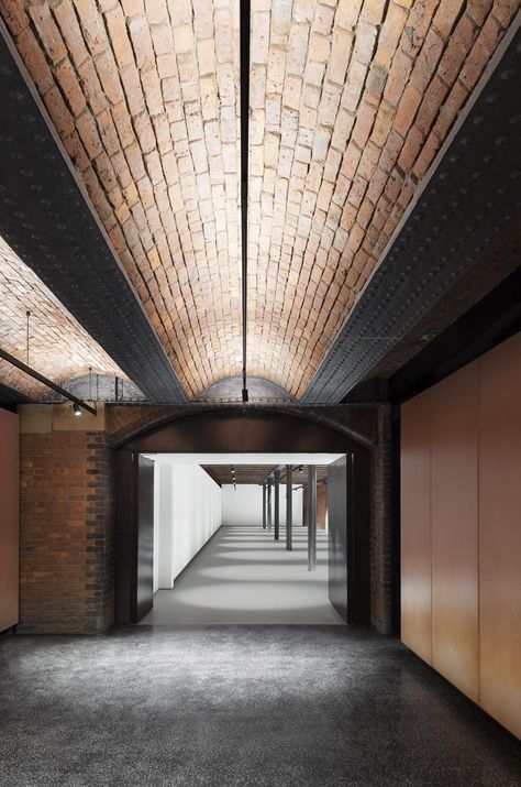 London architects Carmody Groarke redesign vast, Victorian vaulted space for Manchester museum's flexible gallery Museum Architect, Glass Panel Wall, Barrel Vault Ceiling, Exhibition Company, Architecture Company, Light Pollution, Courtyard House, False Ceiling, Historical Architecture