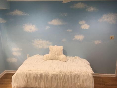 Ombré blue wall with clouds. Used 3 colors of paint and sponged the clouds on once dry. Clouds Painting On Wall, Diy Cloud Painting On Wall, Blue Cloud Bedroom, Clouds Painted On Wall, Cloud Wallpaper Bedroom, Blue Wall With Clouds, Boys Bedroom Wallpaper, Wall Cloud, Cloud Wall Hanging