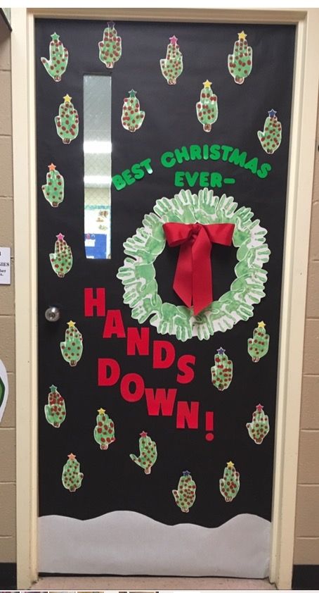 Students' hands decorate a fun, festive Christmas classroom door, celebrating not only each student but the whole class together! 1st Grade Christmas Door Decorations, Door Decorations Classroom Christmas Fun, This Class Is Only Silent At Night Door, Decorate Classroom Door For Christmas, Christmas Class Door Decorations, Classroom Doors For Christmas, Christmas Daycare Door Ideas, Teacher Christmas Door Ideas, Decorated Doors For Christmas