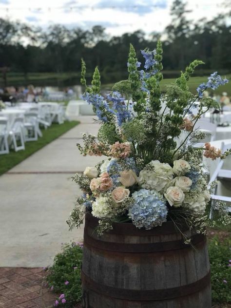 Whiskey Barrel Wedding Flowers, Barrel With Flowers, Bubbly Brunch, Barrel Flowers, Whiskey Barrel Wedding, Blue Flower Arrangements, Backyard Celebration, Diy Wedding Arch, Lavender Wedding Flowers