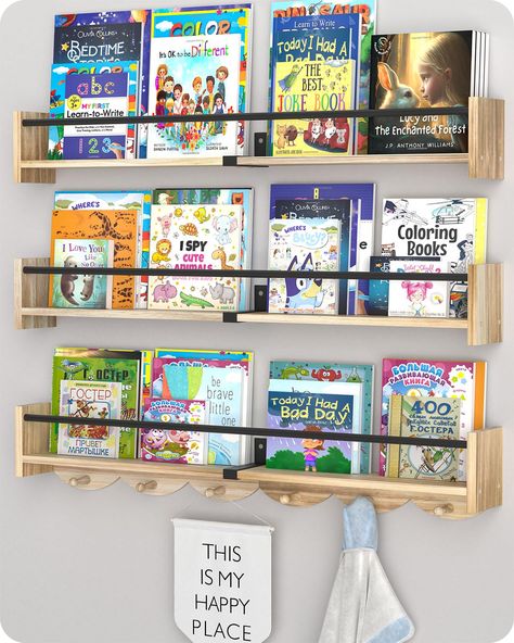 PRICES MAY VARY. Elegant Appearance : This book shelf for wall with a lively wavy shape and hook combination is the latest appearance design of our professional team. It not only has an elegant appearance, but also increases the use function of the kids bookshelf, which kids will like very much. (Patent protection has been applied for) Large Storage Space : This is a nursery shelf with large storage space made of unpainted pine wood and metal, the size is 32x5x4 inches. Can hold more kids books, Boys Bookshelf Ideas, Cute Book Storage Ideas, Book Shelves For Kids Room, Nursery Bookshelf Wall, Kids Book Storage Wall, Bookshelf For Kids Room, Children’s Book Storage, Kids Bedroom Shelving Ideas, Kids Book Shelf Ideas