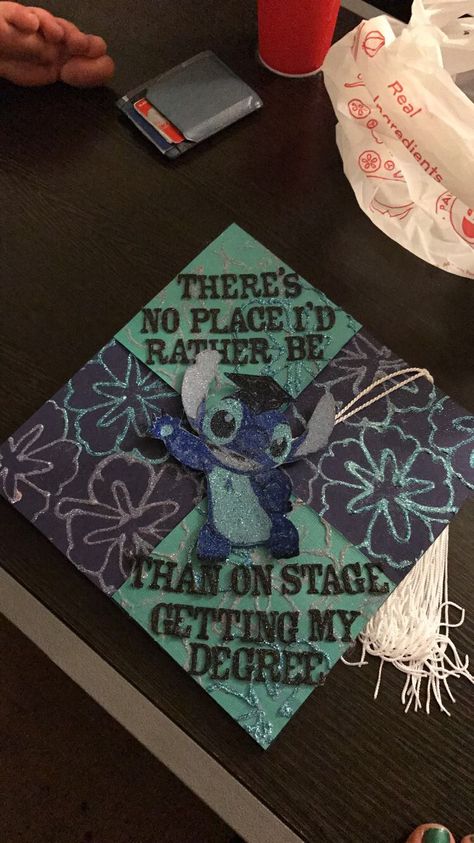 Lilo and stitch graduation cap "There's no place I'd rather be than on stage getting my degree." Based off of Hawaiian rollercoaster ride. // follow us @motivation2study for daily inspiration Lilo And Stitch Graduation, Stitch Graduation Cap, Cap Decorating Ideas, Stitch Graduation, Disney Graduation Cap, Funny Graduation Caps, Creative Graduation Caps, Disney Graduation, College Grad Cap Ideas