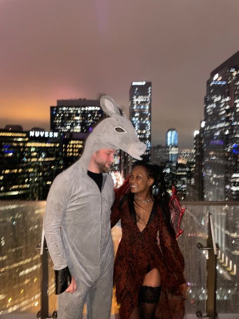 Picture of a couple celebrating Halloween wearing a gray donkey costume and a red dragon costume with wings from the movie shrek Halloween For 2 People, Donkey Dragon Costume, Donkey And Dragon Couple Costume, Halloween Costumes For Couples 2024, Shrek And Donkey Costume, Donkey And Dragon Costume, Dragon And Donkey, Halloween Costume For Duos, Best Couple Costumes Halloween