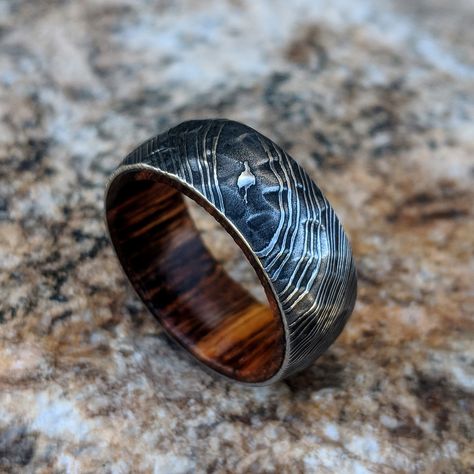 Unmatched selection of custom rings available in our shop today!  Don't settle for an ordinary #DamascusSteelRing when you can design your own in a few easy steps.  If you can dream it we can make it!  #WeddingBands #MensWeddingBands #DamascusSteelRings #WeddingPlanner #MensRings #Engaged #RingGoals #WeddingTips Damascus Wedding Band, Damascus Steel Wedding Band, Damascus Ring, Damascus Steel Ring, Titanium Wedding Rings, Custom Wedding Rings, Men's Wedding Ring, Wooden Ring, Unique Wedding Bands