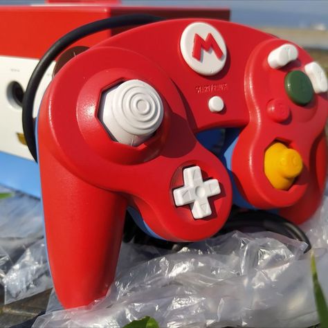 Was loyal to Super Mario colors. Comes as complete set with original adaptor and leads. 
Its limited production quantity.
Sold 3 of 40 (17.07.2022)

Want to grab yours? ETSY link Below Custom Gamecube Controller, Custom Gamecube, Mario Costume, Gamecube Controller, Custom Consoles, Nintendo Gamecube, New Model, Super Mario, Gaming Products