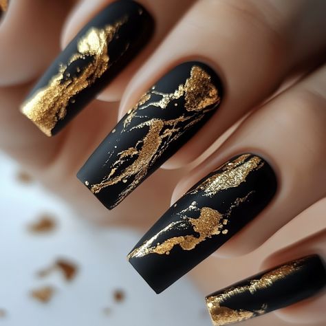 Make a statement with matte black nails featuring bold gold marble accents. The contrast between the matte finish and the metallic gold foil creates a stunning effect, perfect for those who love a dramatic, sophisticated look. Gold Nails With Design, Gold Marble Nail Designs, Black Gold Silver Nails, Foil Art Nails, Black Nails With Gold Flakes, Black And Gold Marble Nails, Foil Nail Art Designs Ideas, Black And Gold Nail Designs, Gold Foil Nails