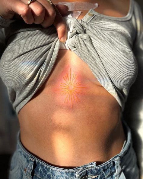 All Posts • Instagram Tattoo Around Belly Button, Yellow Ink Tattoos, Belly Button Tattoos, Yellow Tattoo, Belly Button Tattoo, Star Tattoo, Yellow Star, Badass Tattoos, Chest Piece