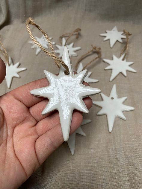 North Star 🌟 Christmas ornaments in stoneware clay. Comes tied with a natural string. size 10cm All items packed with care, padded with layers of bubble wrap and packaging cardboard so your item arrives safe. If any issues with delivery we are happy to replace your item free of charge. Nativity Clay Ornaments, Sculpt Christmas Ornaments, Ceramic Garland Christmas, Salt Clay Ornaments, Diy Small Ornaments, Clay Star Ornaments, Clay Diy Ornaments, Christmas Clay Decor, Ceramic Christmas Decor