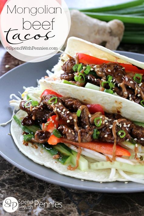 Like PF Chang's Mongolian Beef? You'll love this Mongolian Beef Taco recipe!  Ginger & soy flavored beef, loaded up with fresh veggies & an amazing sauce! Easy Mongolian Beef, Beef Tacos Recipes, Main Dish Casseroles, Fusion Recipes, Beef Tacos, Spend With Pennies, Mongolian Beef, Tacos Beef, Taco Recipes