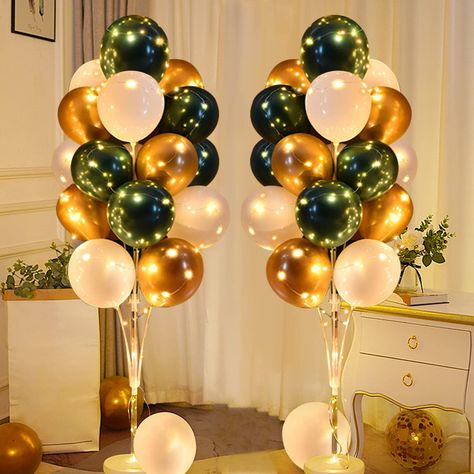 PRICES MAY VARY. Floor Balloon Stand Sets: You will receive 2 reusable balloon holder bases, 44 sticks, 26 balloon cups, 32 multi-color metal balloons (14 green, 10 gold, 8 white balloons), 2 light strings and 1 glue dot. Let beautiful balloons table decorations for party give you a wonderful party experience. Exquisite Design: The ingenious balloon can add surprise and romance to your gift, party balloons is made of natural latex, and the material is safe and reliable. Green, white and gold bal Christmas Birthday Theme Party, Emerald Party Decorations, Green And Gold Centerpieces Simple, House Party Decorations Birthday Adult, Green And Gold Party Decor, Green And Gold Decorations Party Ideas, Green And Gold Centerpieces, Green And Gold Party Decorations, Green And Gold Birthday Party