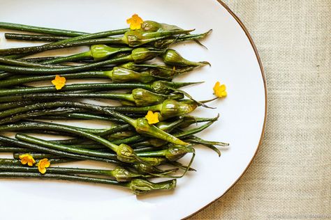 Savory Grilled Garlic Scapes | Food52 Garlic Shoots, Grilled Garlic, Grow Garlic, Grilled Roast, Garlic Scapes, Csa Recipes, Variety Of Fruits, Roasted Garlic, Food 52