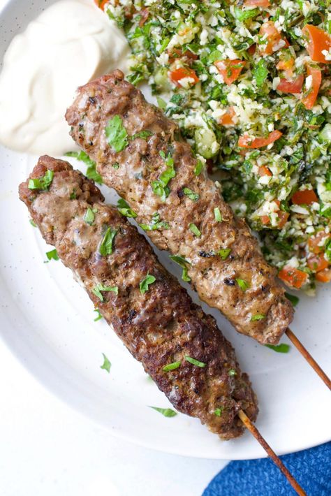 These Whole30 Grilled Kofta are made with a combination of ground beef and lamb plus lots of rich aromatic spices. These 30-minute easy to make skewers are served alongside a creamy lemon tahini sauce for dipping. These Kofta are Whole30, Paleo, Keto, Grain Free, Gluten Free, Dairy Free and Specific Carbohydrate Diet Legal. Grilled Kofta, Middle Eastern Lamb, Beef Kofta, Australian Foods, Lemon Tahini Sauce, Kofta Recipe, Easy Whole 30 Recipes, Specific Carbohydrate Diet, Grilled Beef