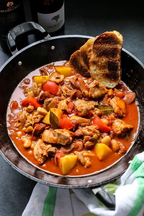 chicken, chorizo, potato/     800 g skinless deboned chicken thigh, cubed     250 g Spanish chorizo sausage, cubed     3 pcs floury potatoes, cubed     400 g can chopped tomato     400 g can butter beans     2 tbsp tomato paste     1.5 cups chicken stock     2 tsp chilli flakes     1 onion, chopped     2 red capsicum, chopped     6 garlic cloves, minced     2 pcs bay leaves     handful basil leaves, chopped     1 tsp dried oregano     sea salt     freshly ground black pepper     olive oil     ba Chorizo And Potato Recipes, Chorizo And Potatoes, Chorizo And Potatoes Dinner, Spanish Chicken Chorizo, Chicken Chorizo Stew, Spanish Chicken Chorizo And Potatoes, Spanish Chicken And Chorizo, Spanish Pork, Spanish Chicken