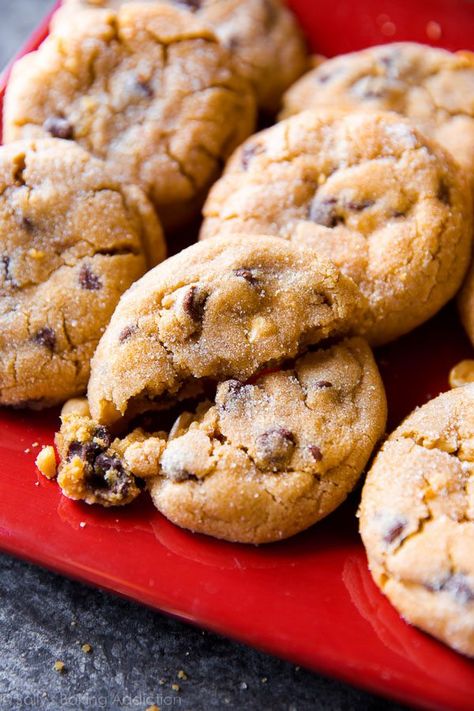 Homemade bakery-style peanut butter chunk cookies are super thick, ultra soft, and filled with chocolate chips. They’re just like peanut butter cookies from your favorite bakery, made at home. Recipe on sallysbakingaddiction.com Peanut Butter Oatmeal Chocolate Chip, Peanut Butter Oatmeal Chocolate Chip Cookies, Sallys Baking, Pb Cups, Peanut Butter Chocolate Bars, Sally's Baking, Peanut Butter Chocolate Chip Cookies, Frozen Cookies, Butter Cookies Recipe